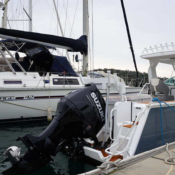 Suzuki Marine engine of moored boat Suzuki Marine engine of moored boat